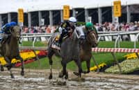 Seize the Grey captures muddy Preakness, giving Lukas his 7th 