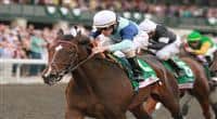 09 October 2011. Aruna and jockey Ramon Dominguez win the Juddmonte Spinster Stakes, GRI $500,000 for owner Flaxman Holdings, and trainer Graham Motion. 