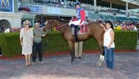 Analog Girl in the Winners Circle after her Allowance Optional Claiming win at Gulfstream Park.