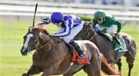 Cape Blanco (IRE), regular rider Jamie Spencer aboard, outduels defending champion Gio Ponti to win the Man O' War Stakes at Belmont Park in Elmont, New York on July 9, 2011 