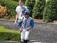 September 15, 2009: Jose Riquelme sprints back to the Jock's Room after the 5th race at Louisiana Downs.