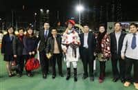 Nash Rawiller celebrates with trainer Me Tsui and connections after Excel Oneself gave the rider the first leg of a treble.