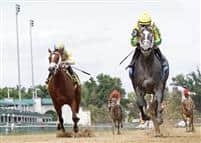 Promise Me Silver wins Debutante Stakes at Churchill Downs.