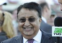 Owner Satish Sanan is all smiles after Odysseus captures the 2010 Tampa Bay Derby